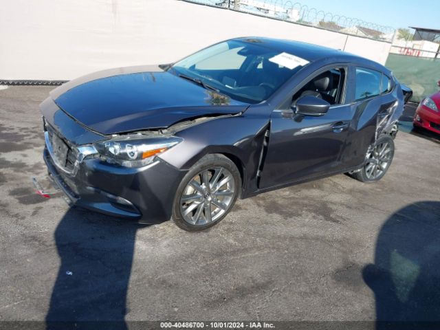 3MZBN1V34JM229876 Mazda Mazda3 Touring