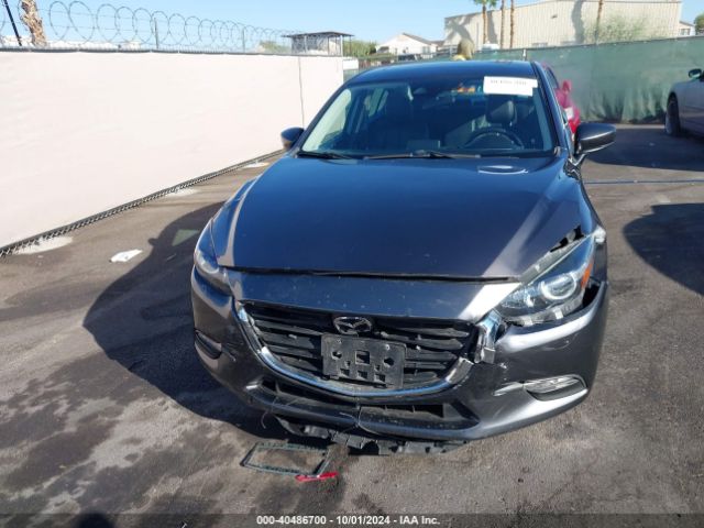 3MZBN1V34JM229876 Mazda Mazda3 Touring