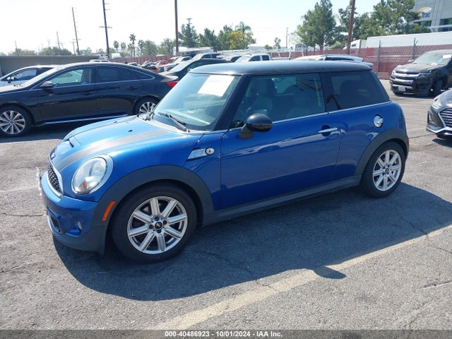 2012 MINI COOPER S WMWSV3C57CTY19736 Photo 1