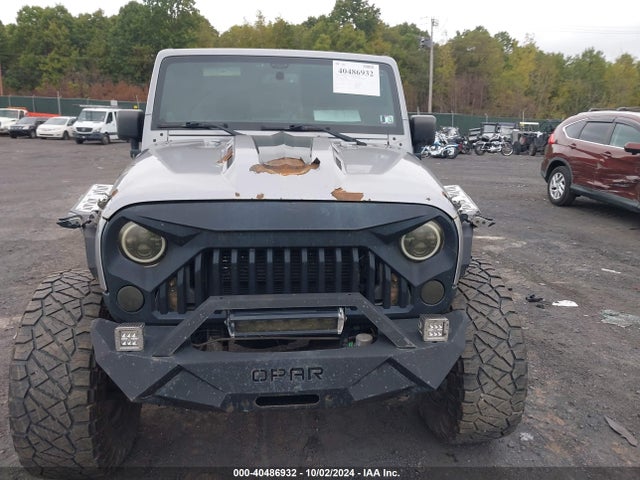 1C4HJWDG2EL199603 Jeep Wrangler Unlimited Freedom Edition