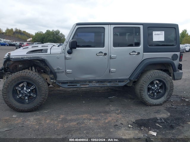 1C4HJWDG2EL199603 Jeep Wrangler Unlimited Freedom Edition