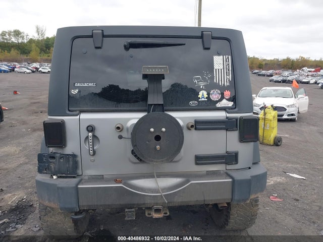 1C4HJWDG2EL199603 Jeep Wrangler Unlimited Freedom Edition