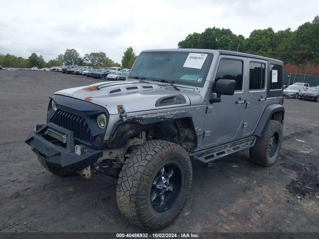 1C4HJWDG2EL199603 Jeep Wrangler Unlimited Freedom Edition