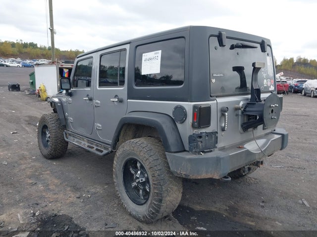 1C4HJWDG2EL199603 Jeep Wrangler Unlimited Freedom Edition