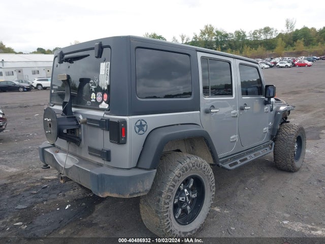 1C4HJWDG2EL199603 Jeep Wrangler Unlimited Freedom Edition