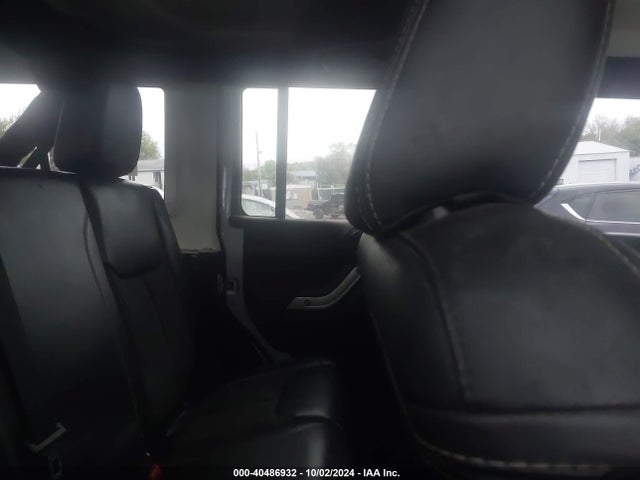 1C4HJWDG2EL199603 Jeep Wrangler Unlimited Freedom Edition