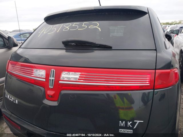 2LMHJ5NK0EBL56011 Lincoln Mkt Livery