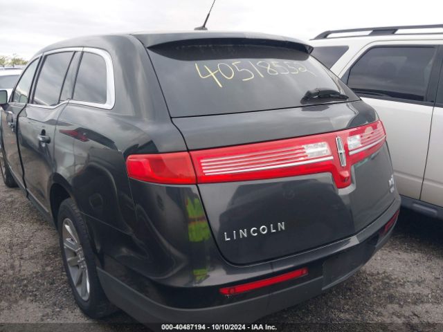 2LMHJ5NK0EBL56011 Lincoln Mkt Livery
