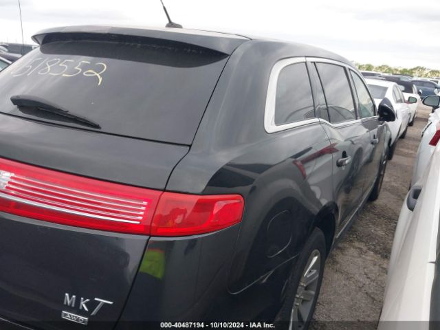 2LMHJ5NK0EBL56011 Lincoln Mkt Livery