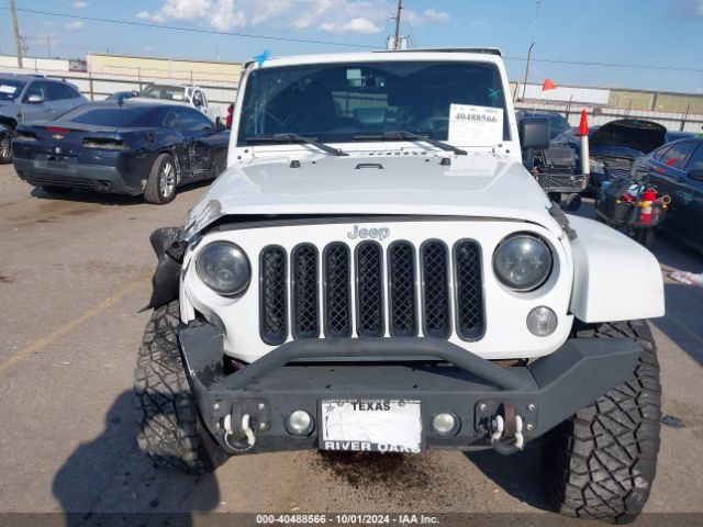 1C4GJWBG2FL534794 Jeep Wrangler Sahara