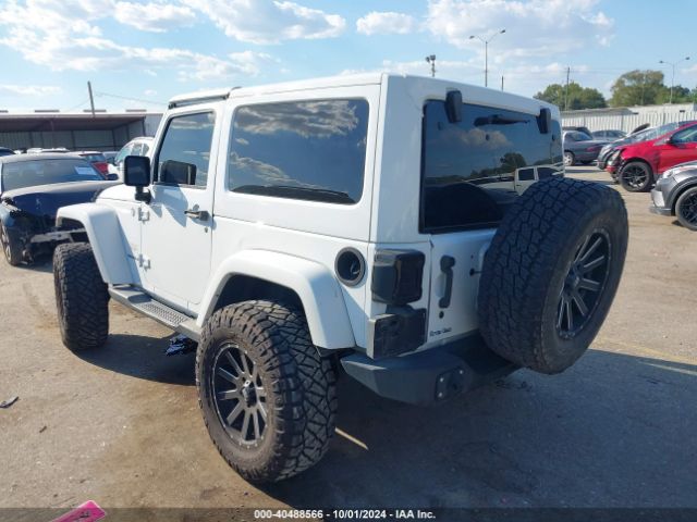 1C4GJWBG2FL534794 Jeep Wrangler Sahara