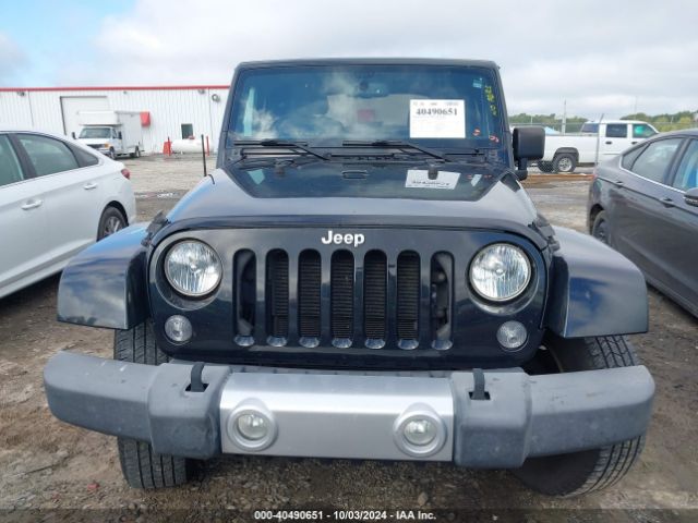 1C4AJWBG0FL571672 Jeep Wrangler Sahara