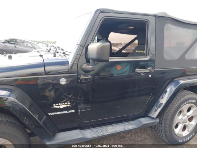 1C4AJWBG0FL571672 Jeep Wrangler Sahara