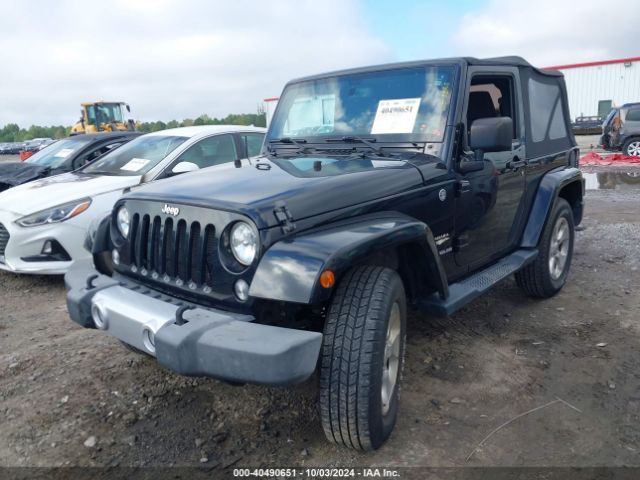 1C4AJWBG0FL571672 Jeep Wrangler Sahara