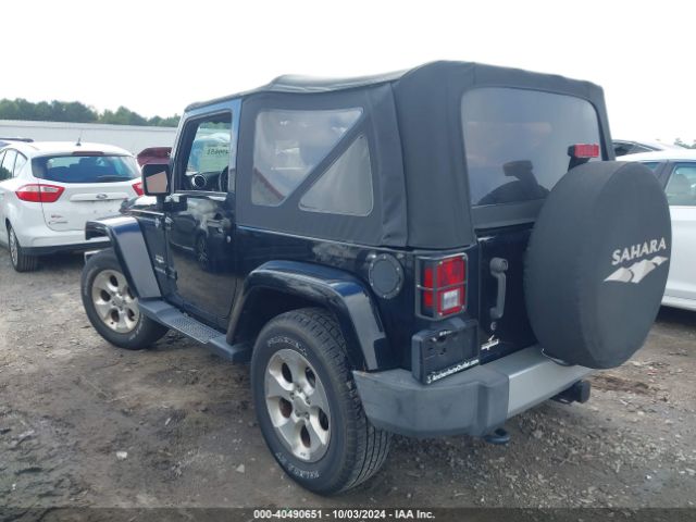1C4AJWBG0FL571672 Jeep Wrangler Sahara