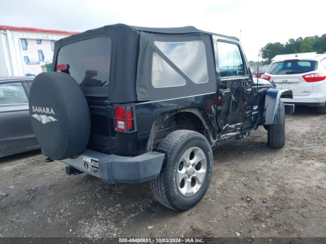 1C4AJWBG0FL571672 Jeep Wrangler Sahara