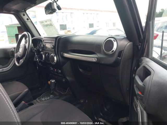 1C4AJWBG0FL571672 Jeep Wrangler Sahara