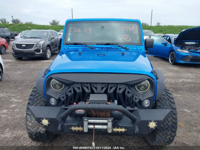1C4BJWDG1GL171168 Jeep Wrangler Unlimited Sport