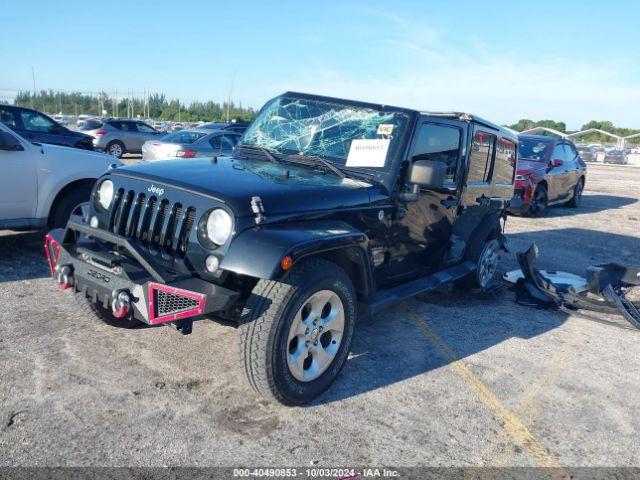 1C4HJWEG3EL137948 Jeep Wrangler Unlimited Sahara