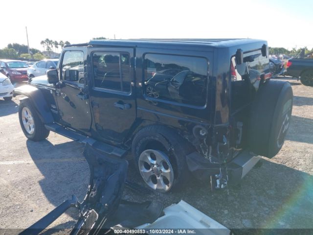 1C4HJWEG3EL137948 Jeep Wrangler Unlimited Sahara