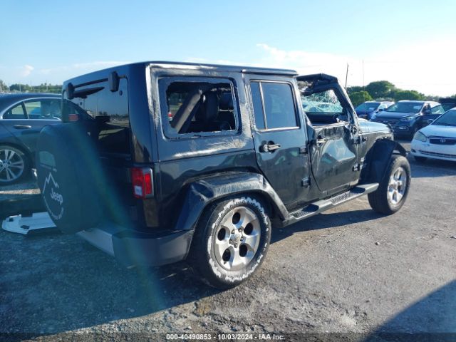1C4HJWEG3EL137948 Jeep Wrangler Unlimited Sahara