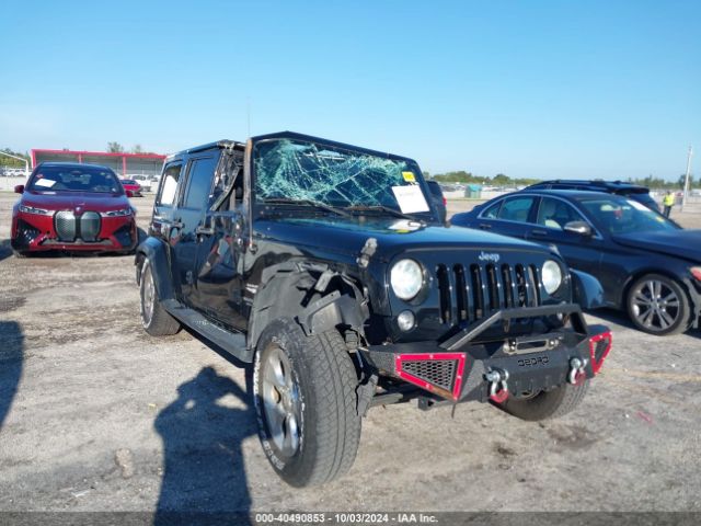 1C4HJWEG3EL137948 Jeep Wrangler Unlimited Sahara