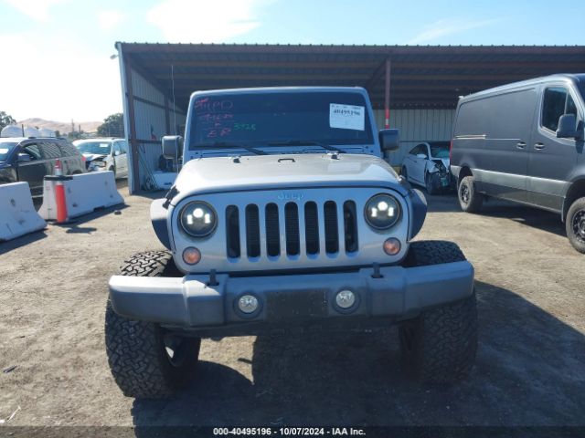 1C4BJWDG0HL557596 Jeep Wrangler Unlimited Sport