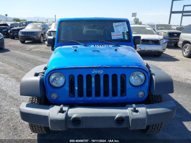1C4AJWAG8FL700355 Jeep Wrangler Sport