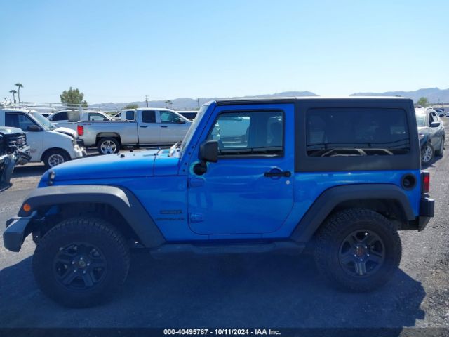 1C4AJWAG8FL700355 Jeep Wrangler Sport