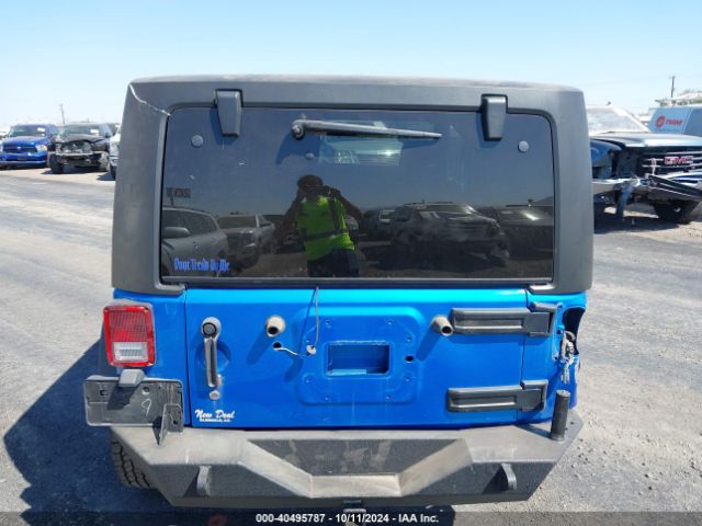 1C4AJWAG8FL700355 Jeep Wrangler Sport