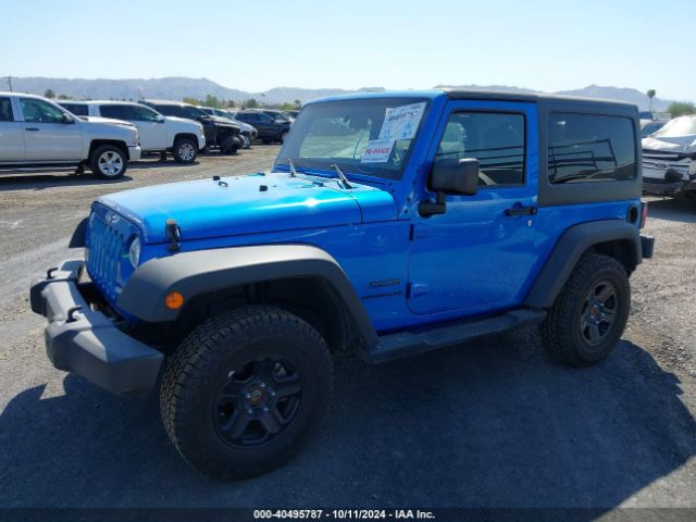 1C4AJWAG8FL700355 Jeep Wrangler Sport