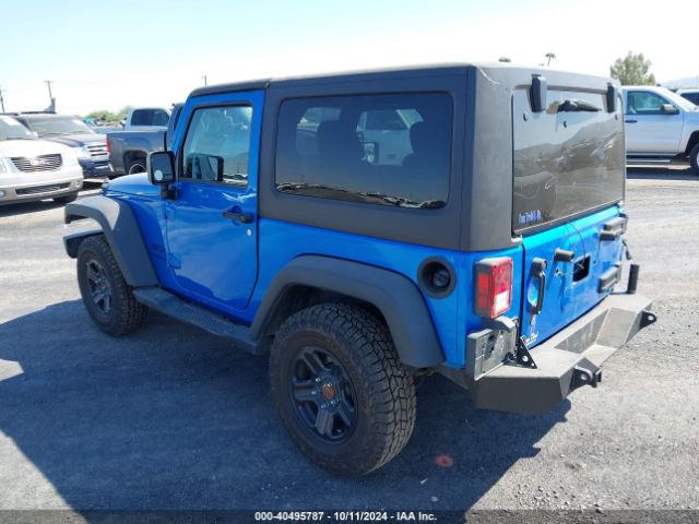 1C4AJWAG8FL700355 Jeep Wrangler Sport