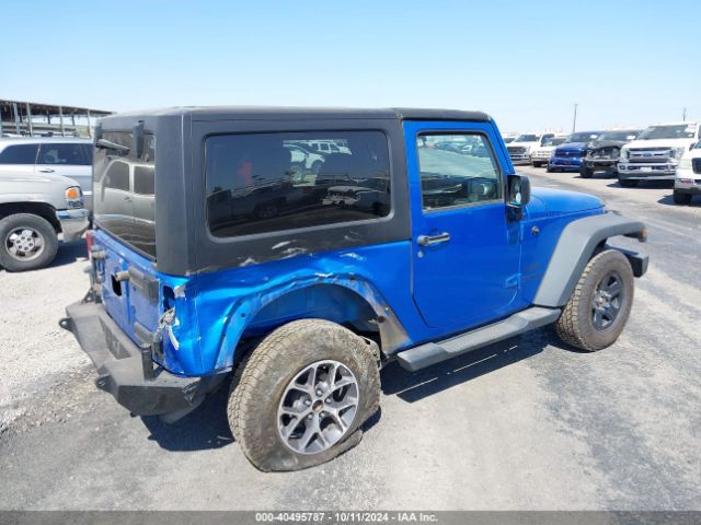 1C4AJWAG8FL700355 Jeep Wrangler Sport