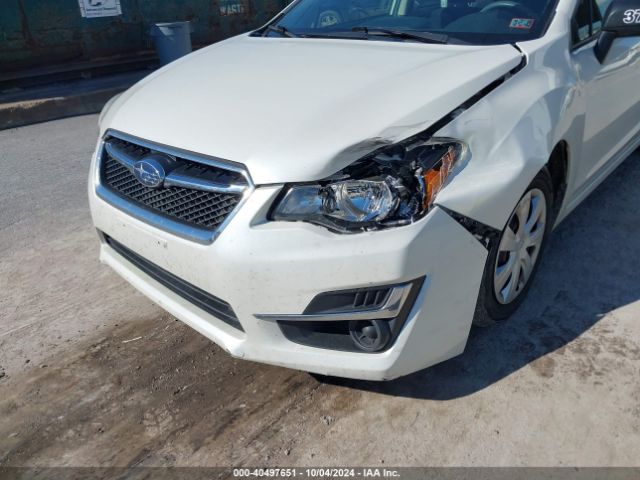 JF1GJAA64GH012447 Subaru Impreza 2.0i