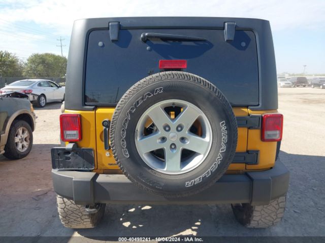 1C4BJWDG3EL218794 Jeep Wrangler Unlimited Sport