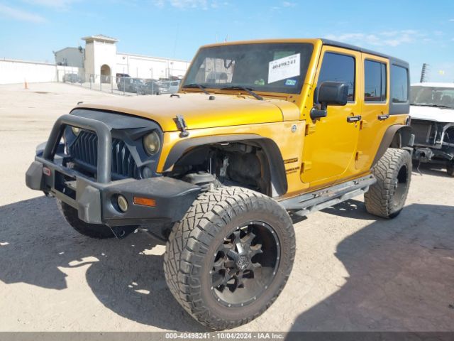 1C4BJWDG3EL218794 Jeep Wrangler Unlimited Sport
