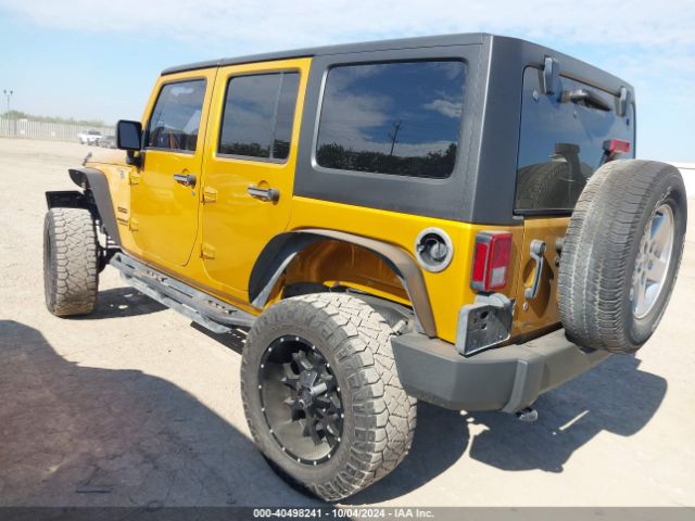 1C4BJWDG3EL218794 Jeep Wrangler Unlimited Sport