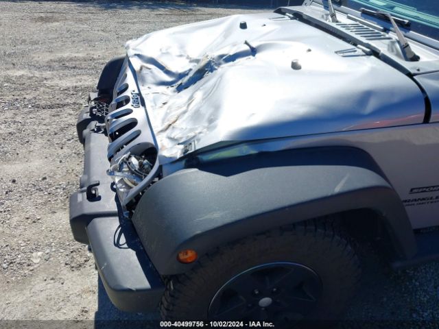 1C4BJWDGXEL101343 Jeep Wrangler Unlimited Sport
