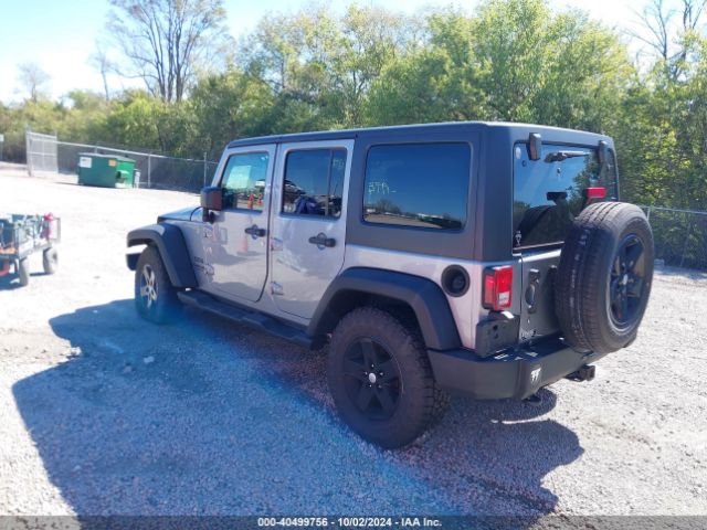 1C4BJWDGXEL101343 Jeep Wrangler Unlimited Sport