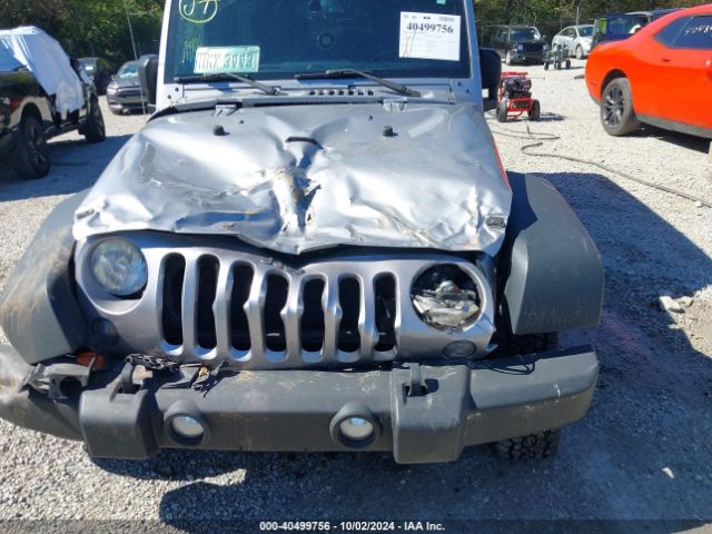 1C4BJWDGXEL101343 Jeep Wrangler Unlimited Sport