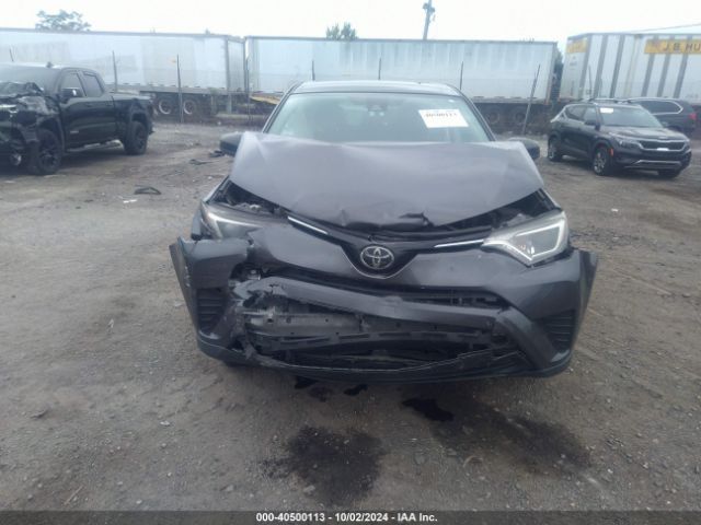 JTMBFREV4JJ738833 Toyota RAV4 LE