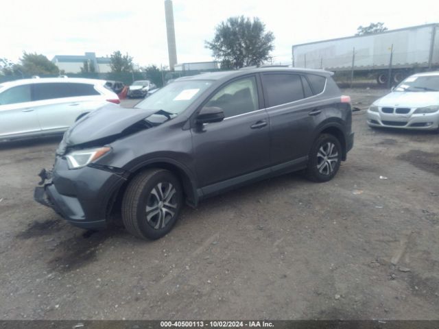 JTMBFREV4JJ738833 Toyota RAV4 LE