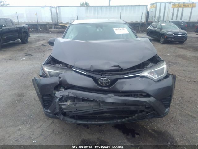 JTMBFREV4JJ738833 Toyota RAV4 LE
