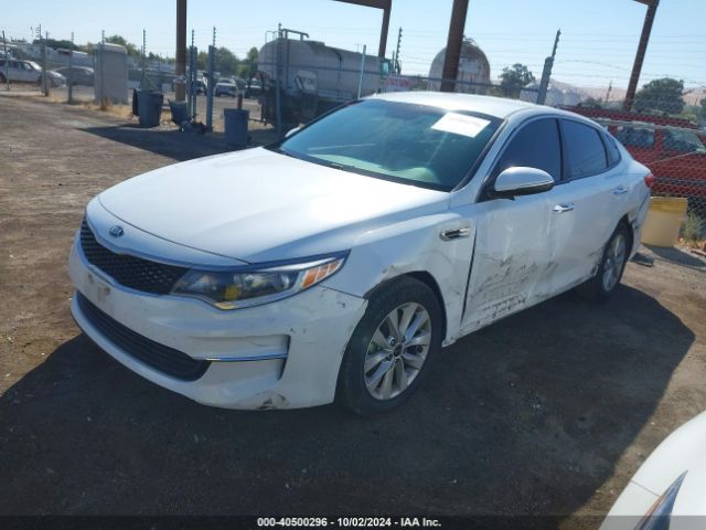 5XXGT4L34JG272098 KIA Optima Lx