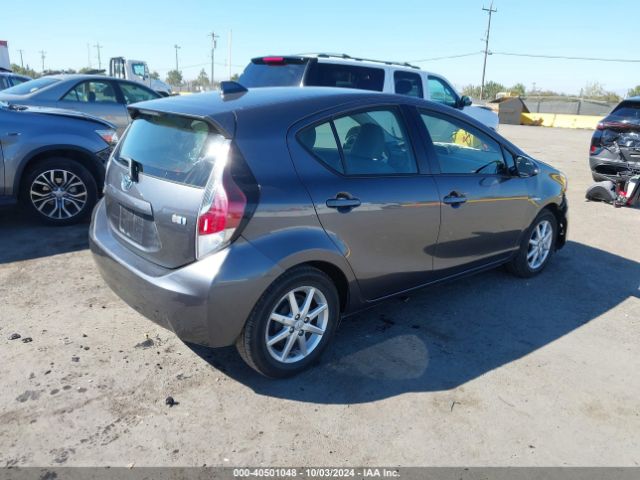 JTDKDTB31F1114999 Toyota Prius C Four