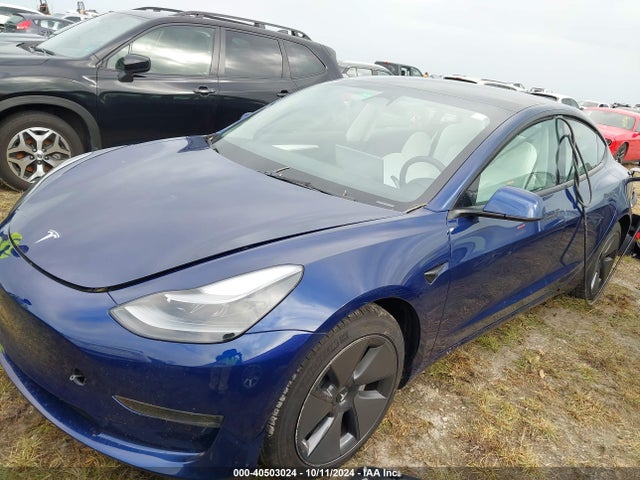 2023 TESLA MODEL 3 5YJ3E1EA4PF553459 Photo 1