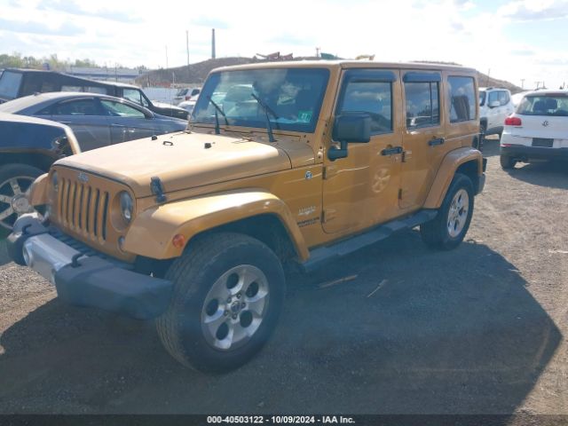 1C4BJWEG3EL183933 Jeep Wrangler Unlimited Sahara