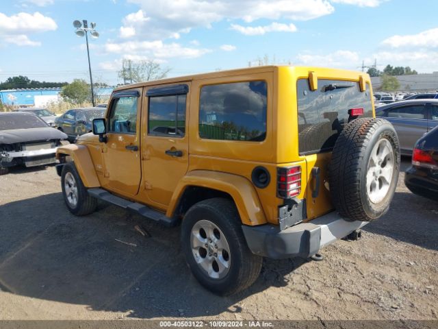 1C4BJWEG3EL183933 Jeep Wrangler Unlimited Sahara