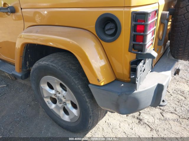 1C4BJWEG3EL183933 Jeep Wrangler Unlimited Sahara