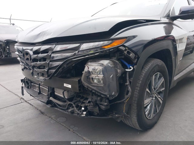 KM8JBCA15NU019761 Hyundai Tucson Hybrid Blue